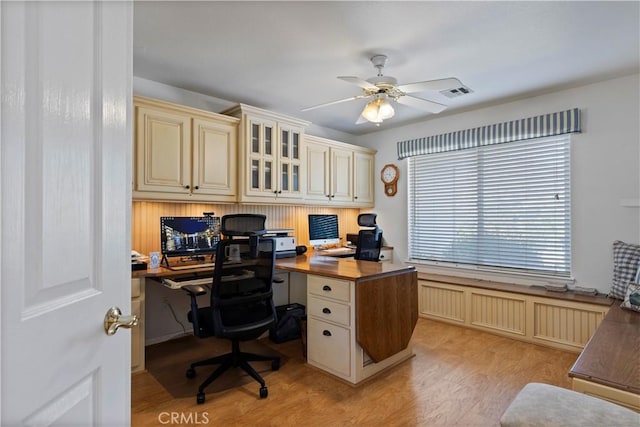23220 Lakeview Dr, Tehachapi, CA 93561 - office area featuring ceiling fan, light wood-style flooring, and built in desk