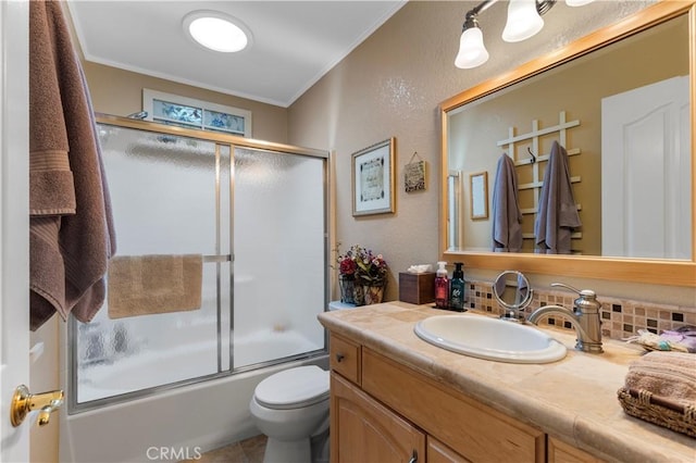 23220 Lakeview Dr, Tehachapi, CA 93561 - bathroom with vanity, crown molding, bath / shower combo with glass door, and a textured wall