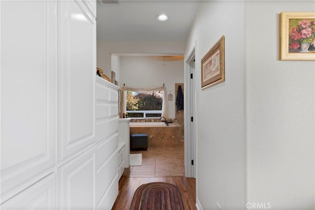 23220 Lakeview Dr, Tehachapi, CA 93561 - hallway with recessed lighting and tile patterned floors