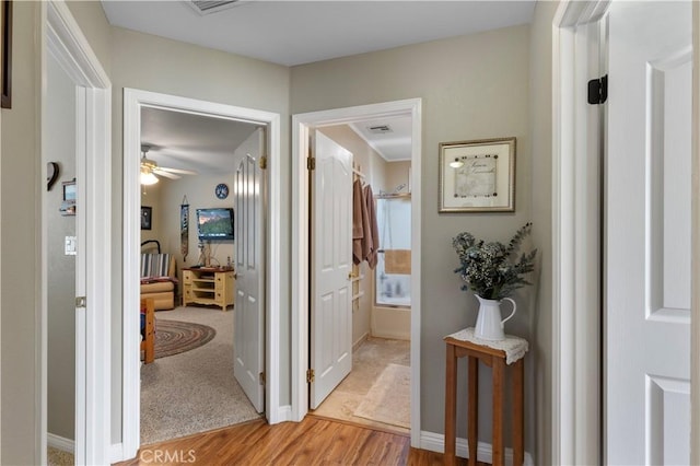23220 Lakeview Dr, Tehachapi, CA 93561 - hallway with light wood finished floors and baseboards