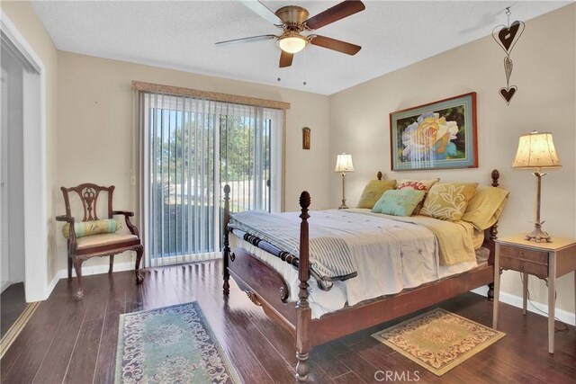15037 Wildflower Ln, Helendale, CA 92342 - bedroom with access to exterior, wood finished floors, and a ceiling fan