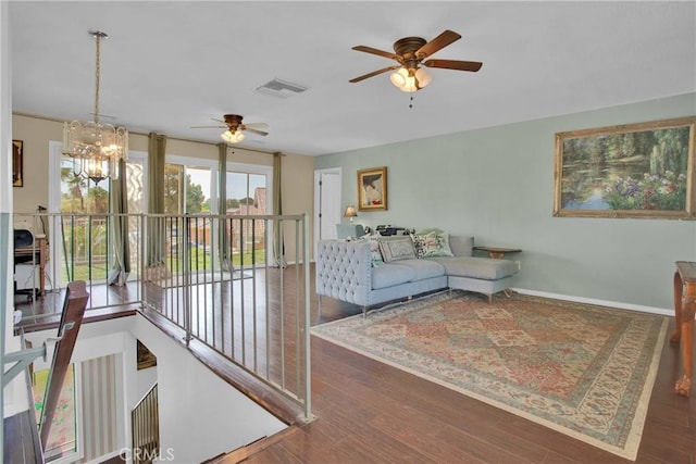 15037 Wildflower Ln, Helendale, CA 92342 - living area featuring ceiling fan, a chandelier, and wood finished floors