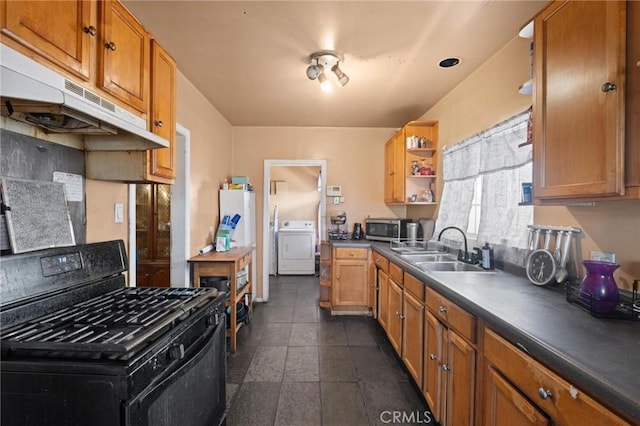 1636 W 70th St, Los Angeles, CA 90047 - kitchen with black gas range, washer / dryer, open shelves, stainless steel microwave, and under cabinet range hood