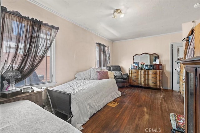 1636 W 70th St, Los Angeles, CA 90047 - bedroom with wood finished floors, ornamental molding, and a fireplace