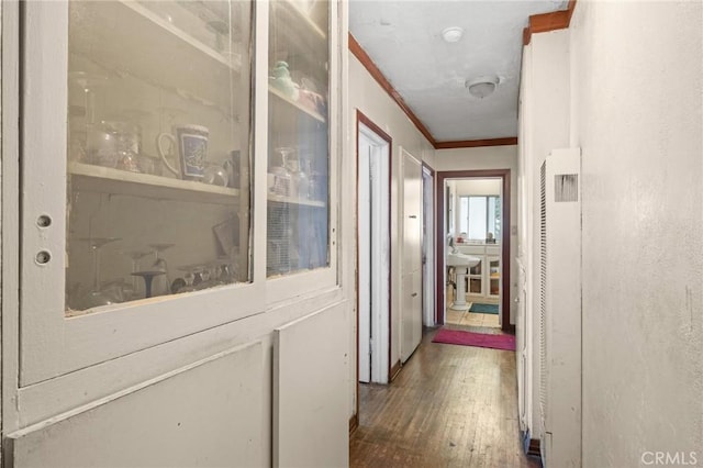 1636 W 70th St, Los Angeles, CA 90047 - corridor with ornamental molding and hardwood / wood-style floors