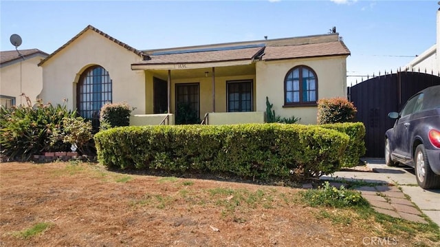 1636 W 70th St, Los Angeles, CA 90047 - view of front of house with stucco siding