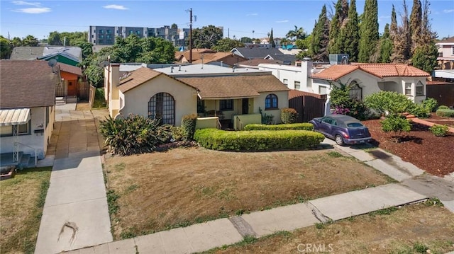 1636 W 70th St, Los Angeles, CA 90047 - view of front facade featuring stucco siding and a residential view