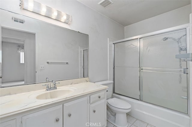 5081 Blackpool Rd, Westminster, CA 92683 - full bath with vanity, tile patterned flooring, and combined bath / shower with glass door