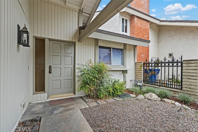5081 Blackpool Rd, Westminster, CA 92683 - doorway to property featuring brick siding and a chimney