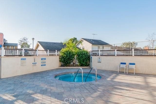 5081 Blackpool Rd, Westminster, CA 92683 - view of swimming pool featuring a hot tub and a patio