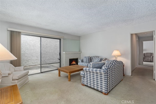5081 Blackpool Rd, Westminster, CA 92683 - carpeted living area featuring a fireplace and a textured ceiling