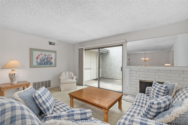 5081 Blackpool Rd, Westminster, CA 92683 - living area featuring carpet flooring, a chandelier, and a textured ceiling