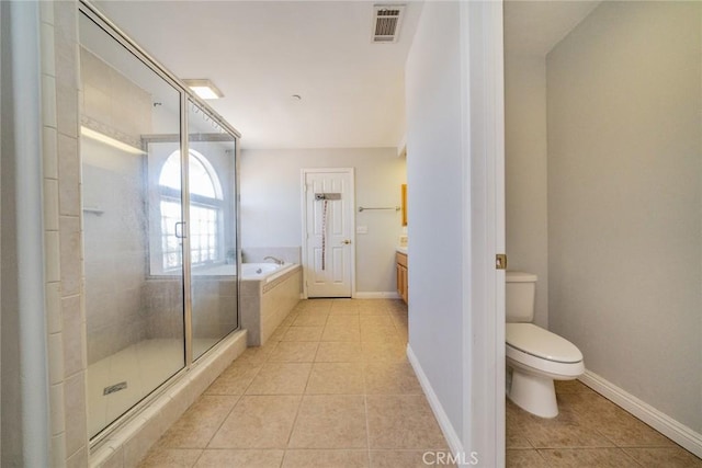 8225 Ailanthus St, Phelan, CA 92371 - full bath with tile patterned floors, a garden tub, a shower stall, and vanity