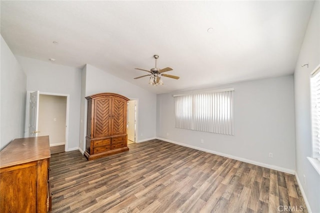 8225 Ailanthus St, Phelan, CA 92371 - unfurnished living room with ceiling fan, wood finished floors, plenty of natural light, and vaulted ceiling