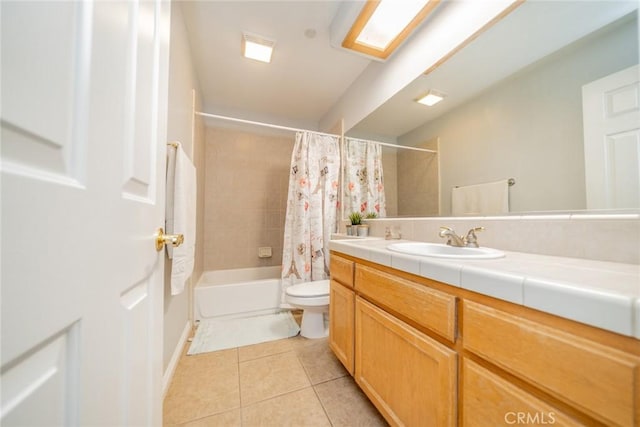 8225 Ailanthus St, Phelan, CA 92371 - full bath with tile patterned flooring, vanity, and shower / bath combo with shower curtain
