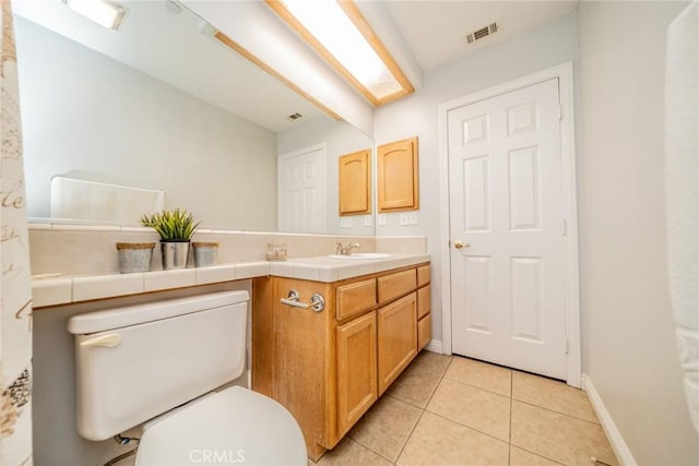 8225 Ailanthus St, Phelan, CA 92371 - bathroom featuring vanity and tile patterned floors