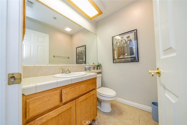 8225 Ailanthus St, Phelan, CA 92371 - bathroom with vanity and tile patterned flooring