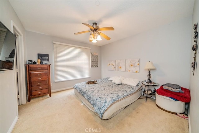 8225 Ailanthus St, Phelan, CA 92371 - bedroom with light colored carpet and ceiling fan