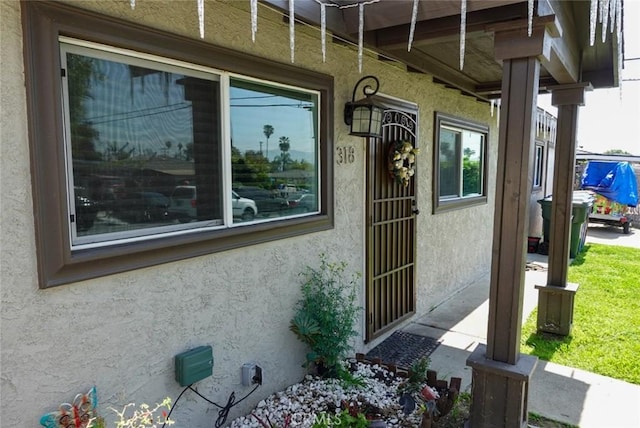 318 Lochmere Ave, La Puente, CA 91744 - view of exterior entry with stucco siding
