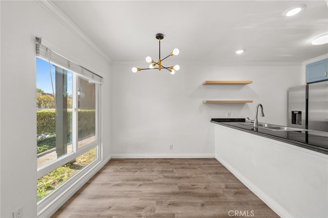 1001 W Stevens Ave Unit 184, Santa Ana, CA 92707 - unfurnished dining area featuring ornamental molding, a chandelier, wood finished floors, and recessed lighting