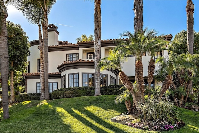 30372 Marbella Vis, San Juan Capistrano, CA 92675 - mediterranean / spanish home with stucco siding, a front yard, and a tile roof