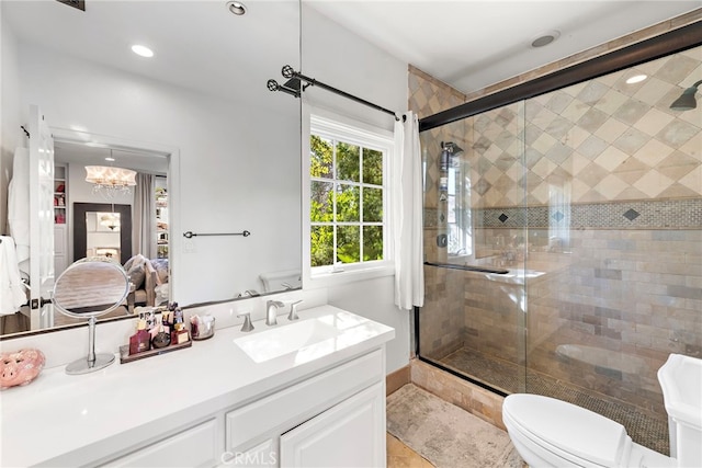 30372 Marbella Vis, San Juan Capistrano, CA 92675 - bathroom with vanity, a shower stall, a chandelier, recessed lighting, and tile patterned floors
