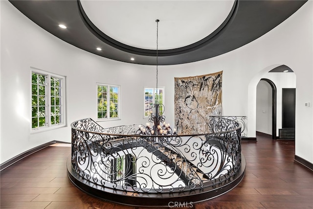30372 Marbella Vis, San Juan Capistrano, CA 92675 - corridor featuring arched walkways, wood finished floors, recessed lighting, an upstairs landing, and a chandelier