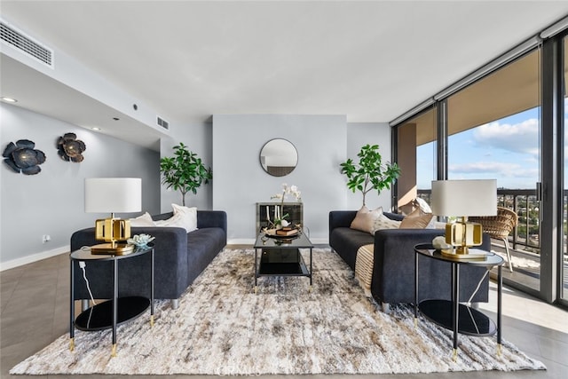 222 Monterey Rd Unit 1203, Glendale, CA 91206 - tiled living room with baseboards and expansive windows