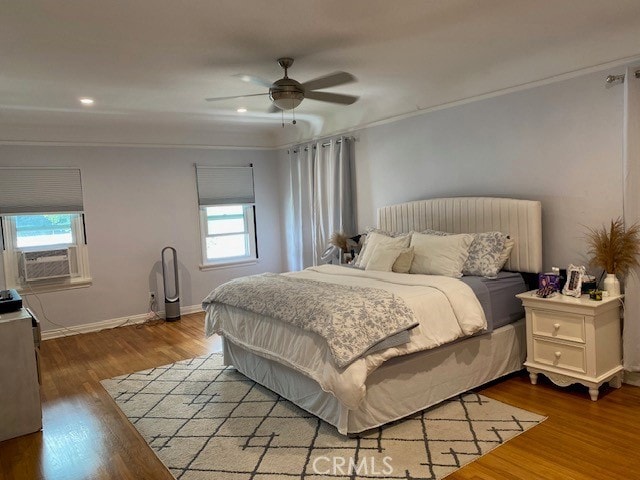 667 S Bronson, Los Angeles, CA 90005 - bedroom with cooling unit, ornamental molding, wood finished floors, recessed lighting, and a ceiling fan