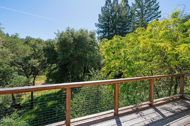 7950 Flynn Creek Rd, Comptche, CA 95427 - wooden terrace featuring a forest view