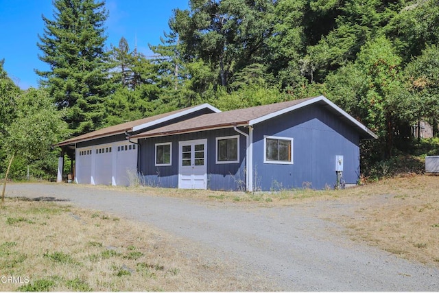 7950 Flynn Creek Rd, Comptche, CA 95427 - ranch-style home with a garage and driveway