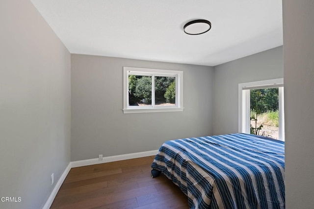 7950 Flynn Creek Rd, Comptche, CA 95427 - bedroom with wood finished floors and baseboards