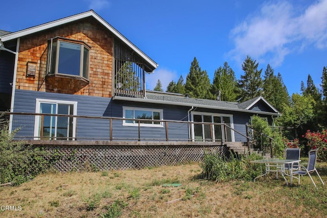 7950 Flynn Creek Rd, Comptche, CA 95427 - back of property featuring a deck