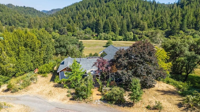 7950 Flynn Creek Rd, Comptche, CA 95427 - view of subject property with a heavily wooded area
