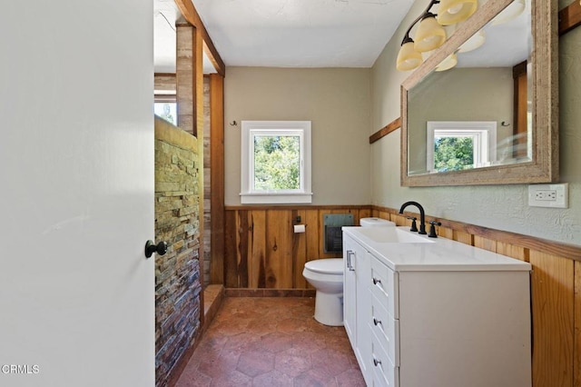 7950 Flynn Creek Rd, Comptche, CA 95427 - bathroom with a wainscoted wall, vanity, and wood walls