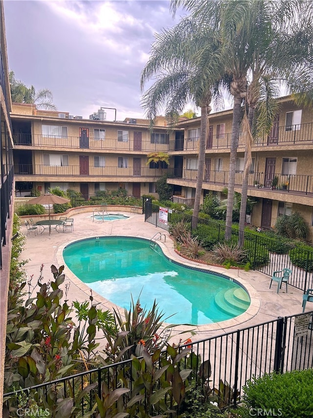 8505 Columbus Ave Unit 107, North Hills, CA 91343 - community pool with a patio