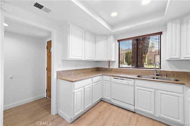31291 E Nine Dr Unit 29F, Laguna Niguel, CA 92677 - kitchen featuring dishwasher, light wood finished floors, a tray ceiling, white cabinets, and recessed lighting
