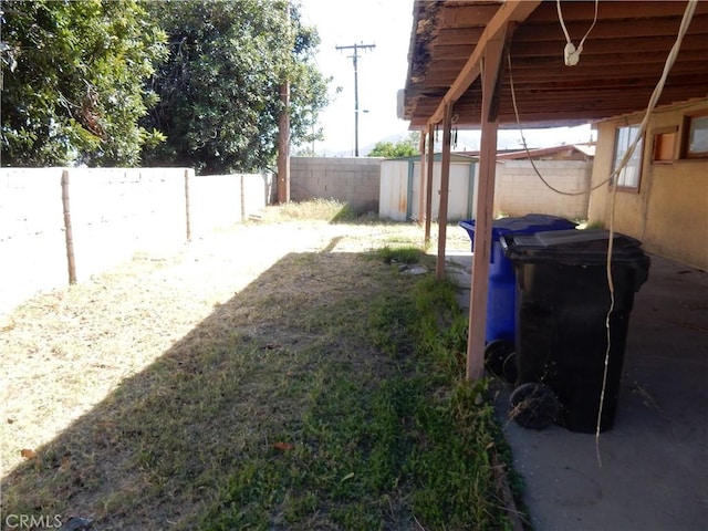 3250 Apple Ave, Jurupa Valley, CA 92509 - fenced backyard featuring a shed