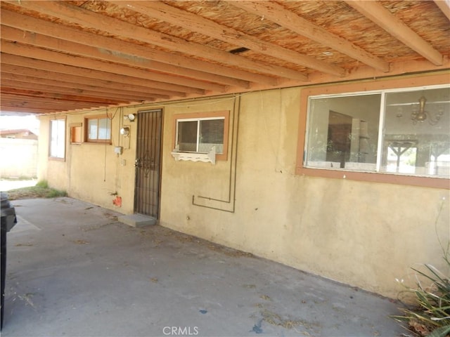 3250 Apple Ave, Jurupa Valley, CA 92509 - doorway to property with stucco siding