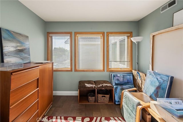 24 Spicewood Way, Irvine, CA 92612 - living area featuring dark wood-style flooring and baseboards