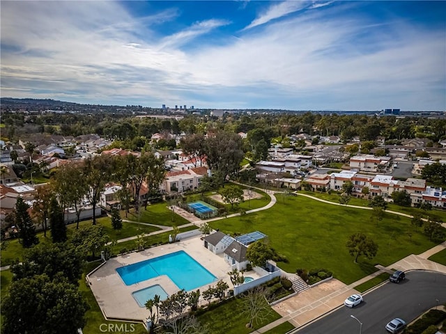 24 Spicewood Way, Irvine, CA 92612 - aerial overview of property's location with a pool and nearby suburban area