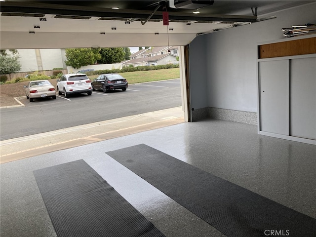 24 Spicewood Way, Irvine, CA 92612 - garage with a garage door opener