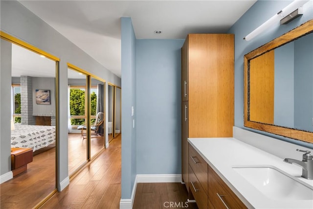 24 Spicewood Way, Irvine, CA 92612 - bathroom with wood finished floors and vanity