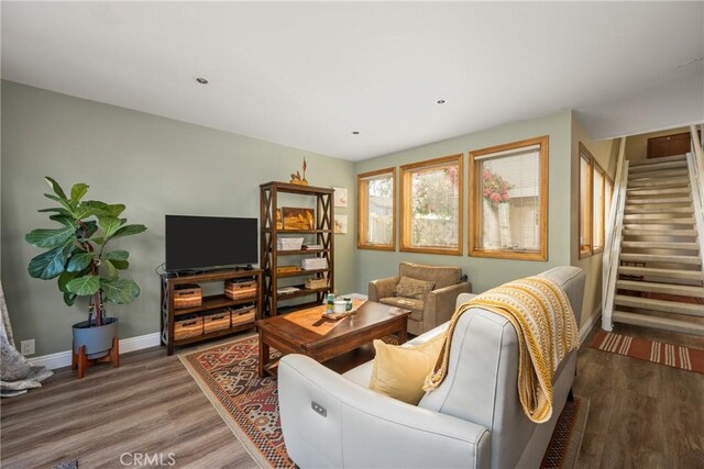 24 Spicewood Way, Irvine, CA 92612 - living area featuring wood finished floors and stairs