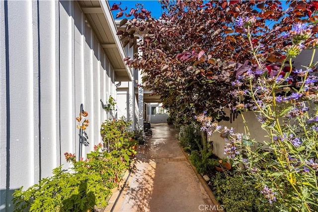 24 Spicewood Way, Irvine, CA 92612 - view of side of home featuring board and batten siding