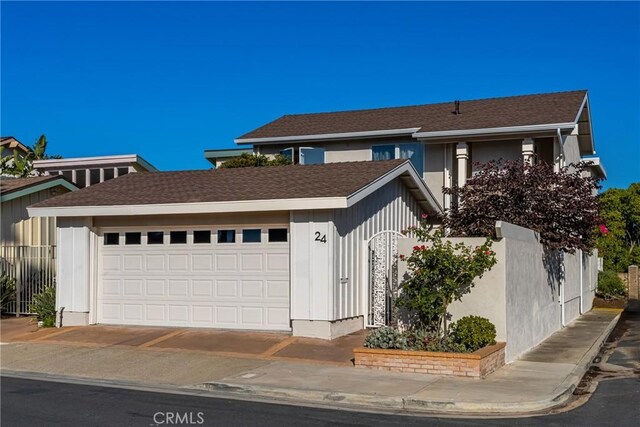 24 Spicewood Way, Irvine, CA 92612 - view of front facade with a garage