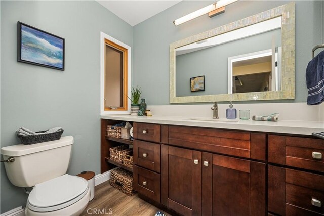 24 Spicewood Way, Irvine, CA 92612 - bathroom featuring vanity and wood finished floors