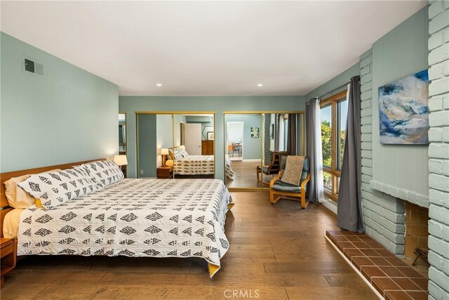 24 Spicewood Way, Irvine, CA 92612 - bedroom featuring wood-type flooring, two closets, and recessed lighting