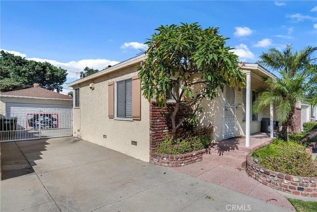 9513 Rex Rd, Pico Rivera, CA 90660 - view of property exterior with crawl space and stucco siding