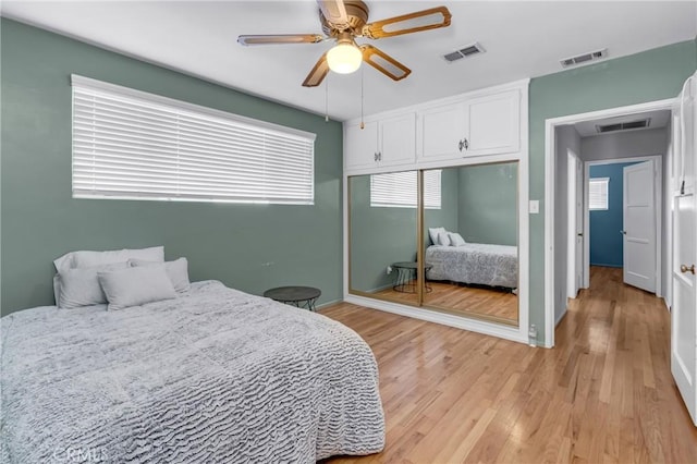 9513 Rex Rd, Pico Rivera, CA 90660 - bedroom featuring a closet, light wood-style flooring, and ceiling fan